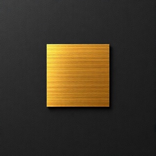 Brushed brass lever surface close-up