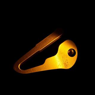 Brass lever under night lighting