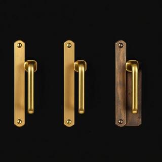 Brushed brass lever at a stone threshold